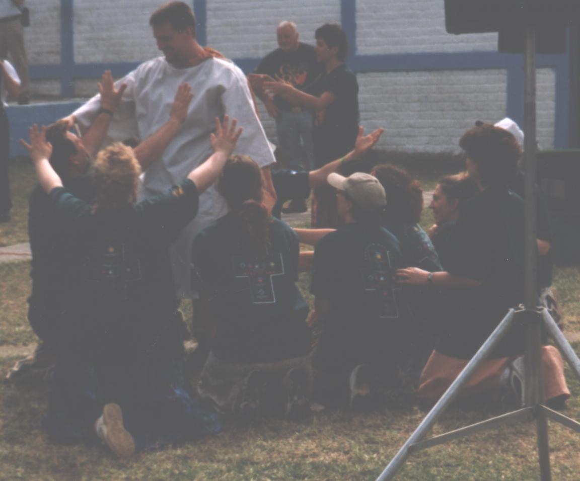 In this drama Pastor Ross Wiseman is playing the part of Jesus. Missionary Chuck Kleffman is kneeled before him.